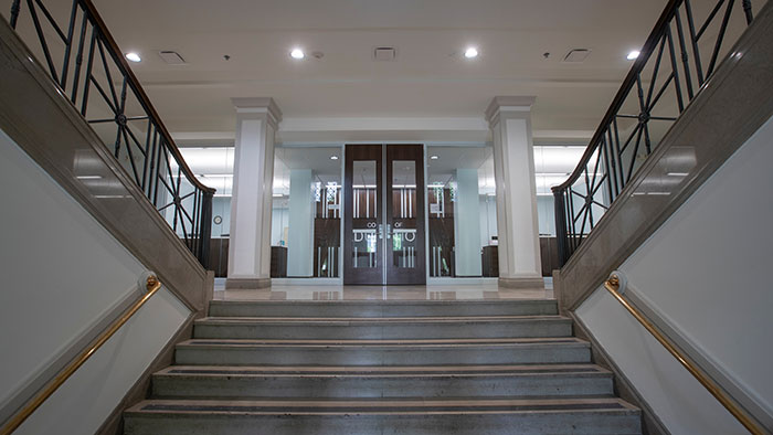 Stairway to College of Education offices inside Hill Hall