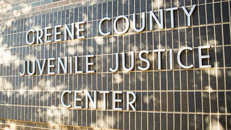 Building sign at Greene County Juvenile Justice Center.