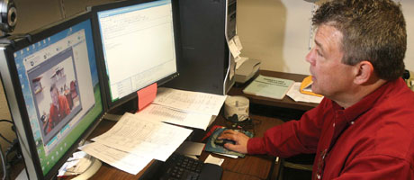 Teacher working at a computer
