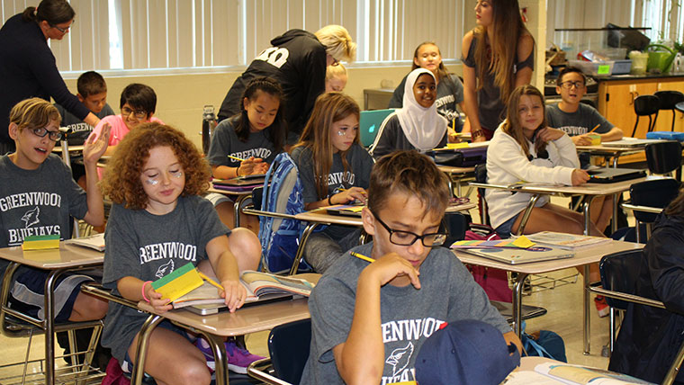 Student teachers instructing Greenwood students