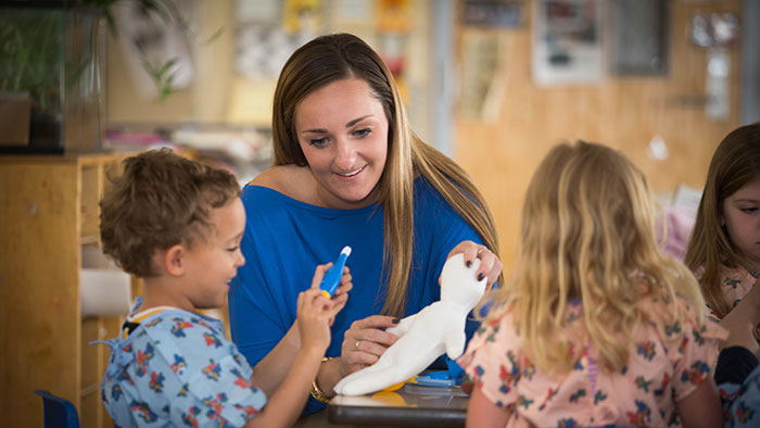 Missouri State student doing therapy session with child