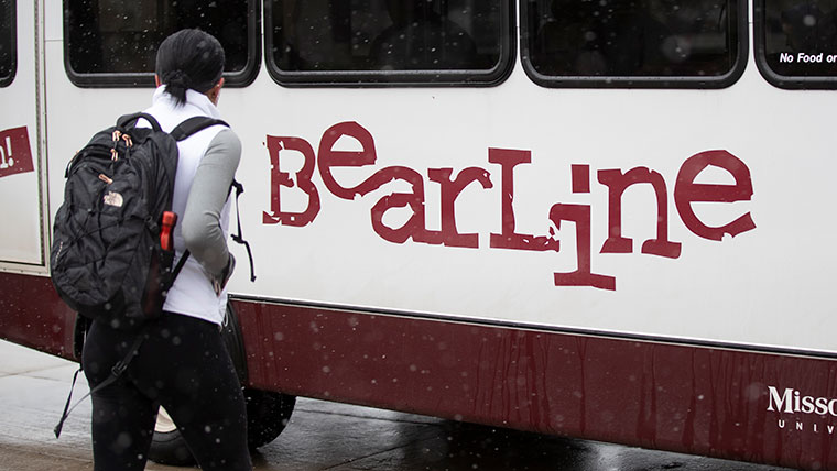 A student gets ready to board the Bear Line